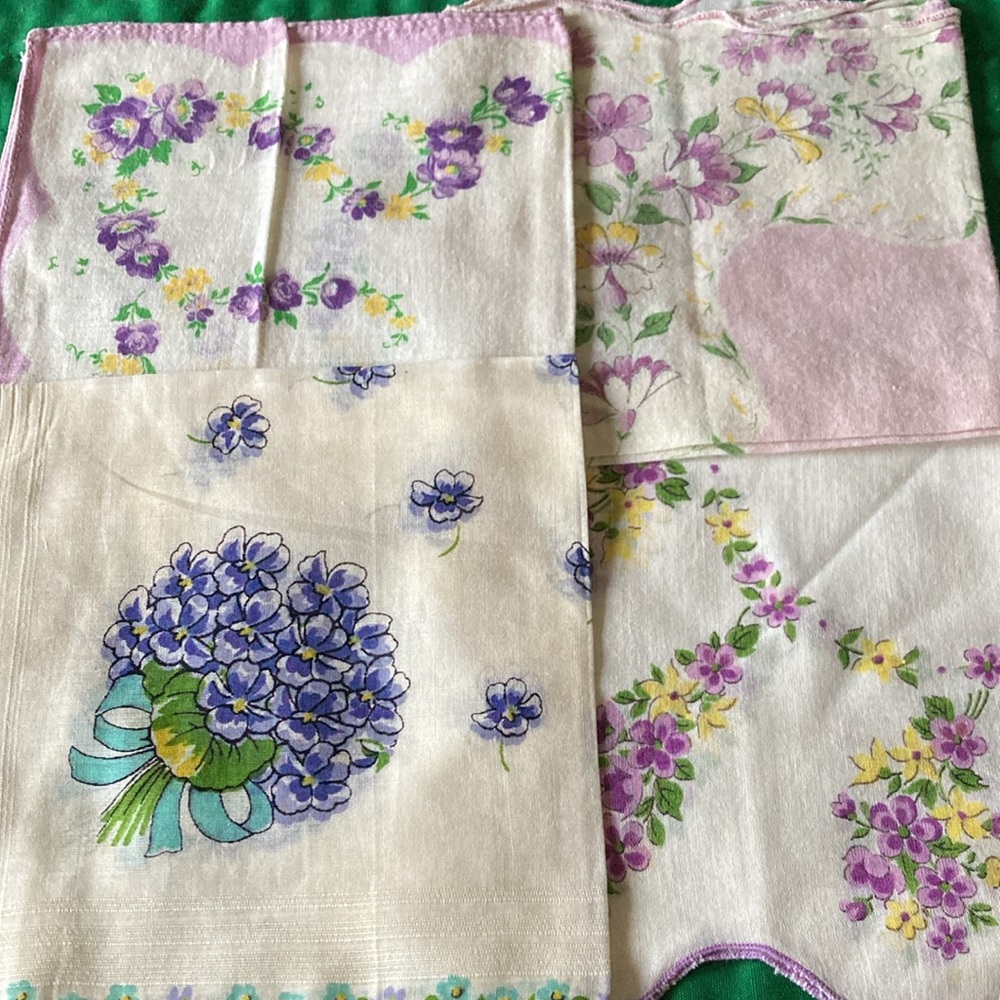 Set of  four ladies vintage floral handkerchieves, wh, purp, & yel.  $18